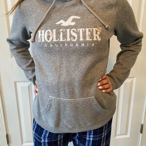Hollister Gray Hoodie with floral letters.  Women’s size medium.  Great Cond